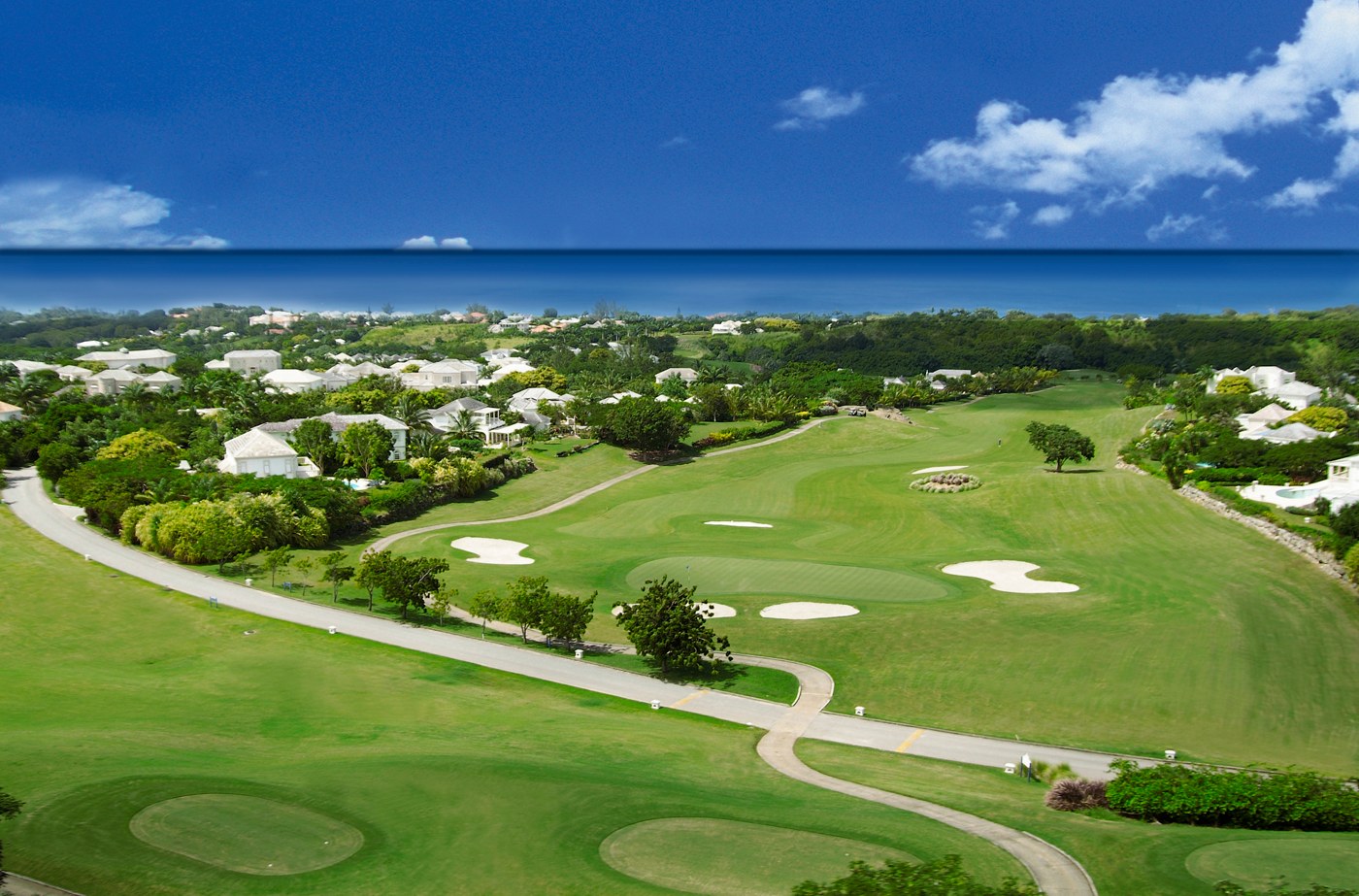Aerial view of the Royal Westmoreland championship golf course reaching toward the Caribbean Sea
