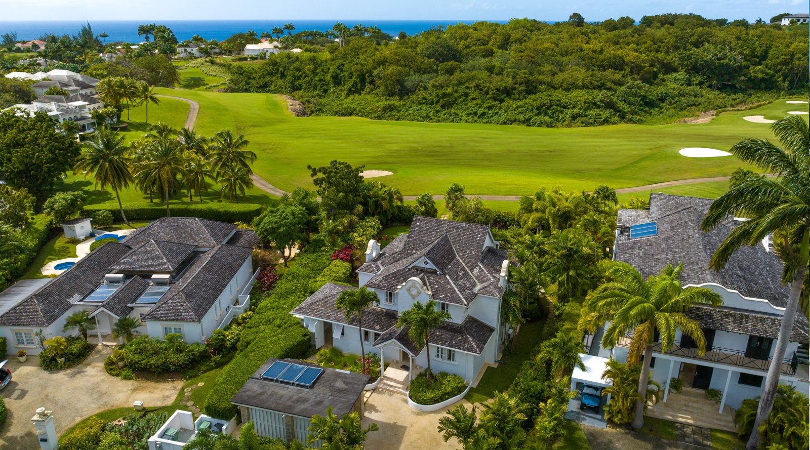 Aerial view of private villas at Royal Westmoreland set beside the golf course